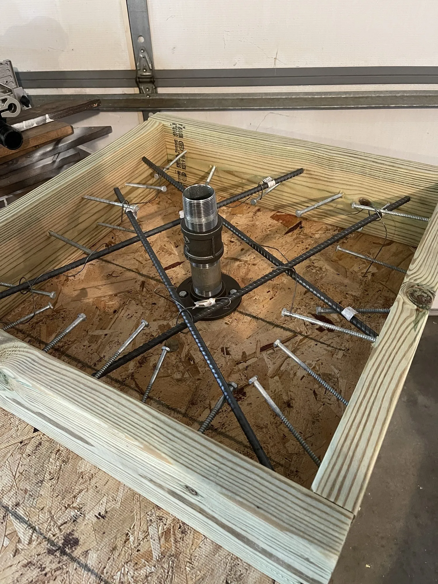 Dad builds the mega tree base: rebar frame, 2021