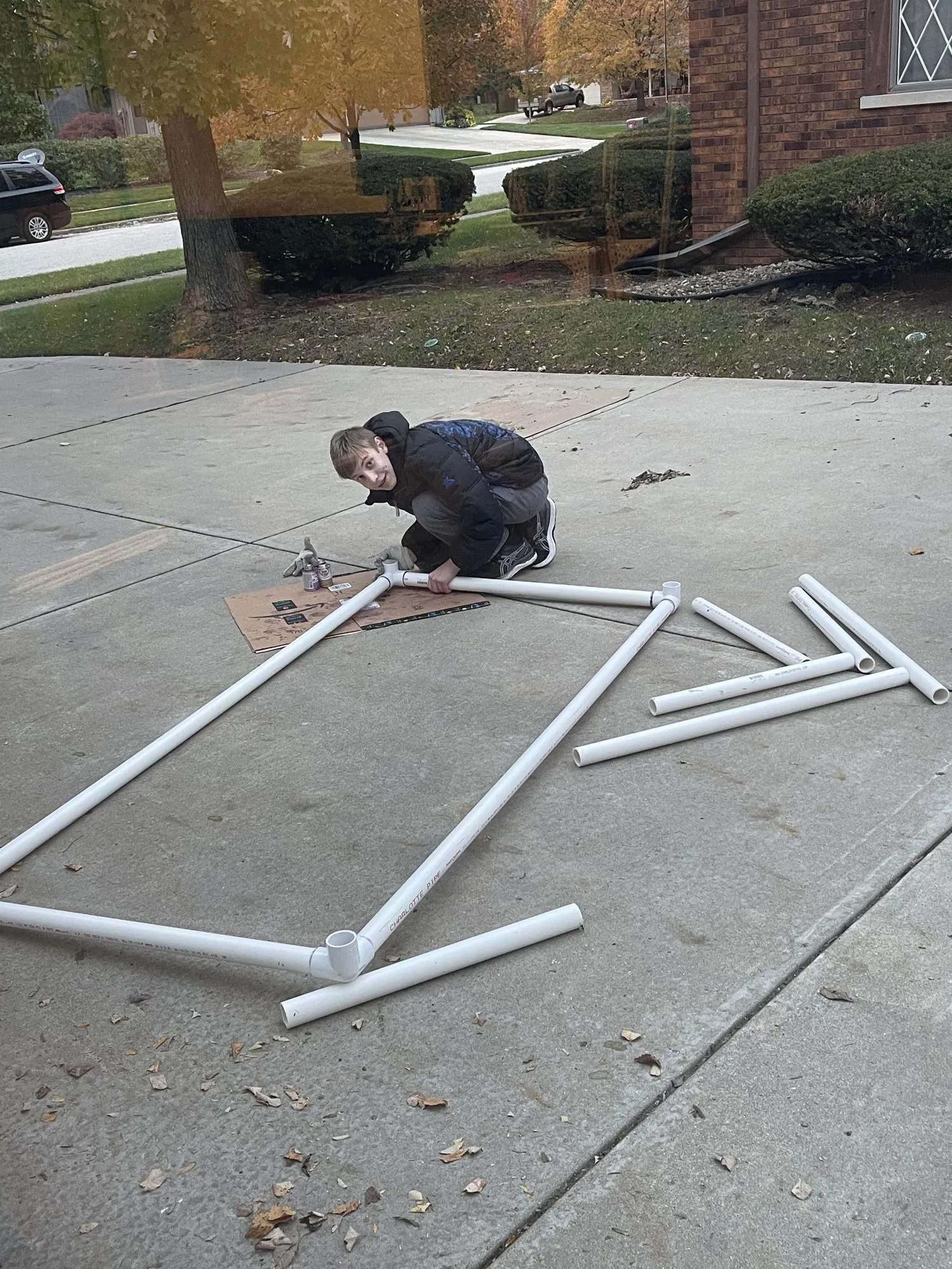Building a prop frame in the driveway, 2021