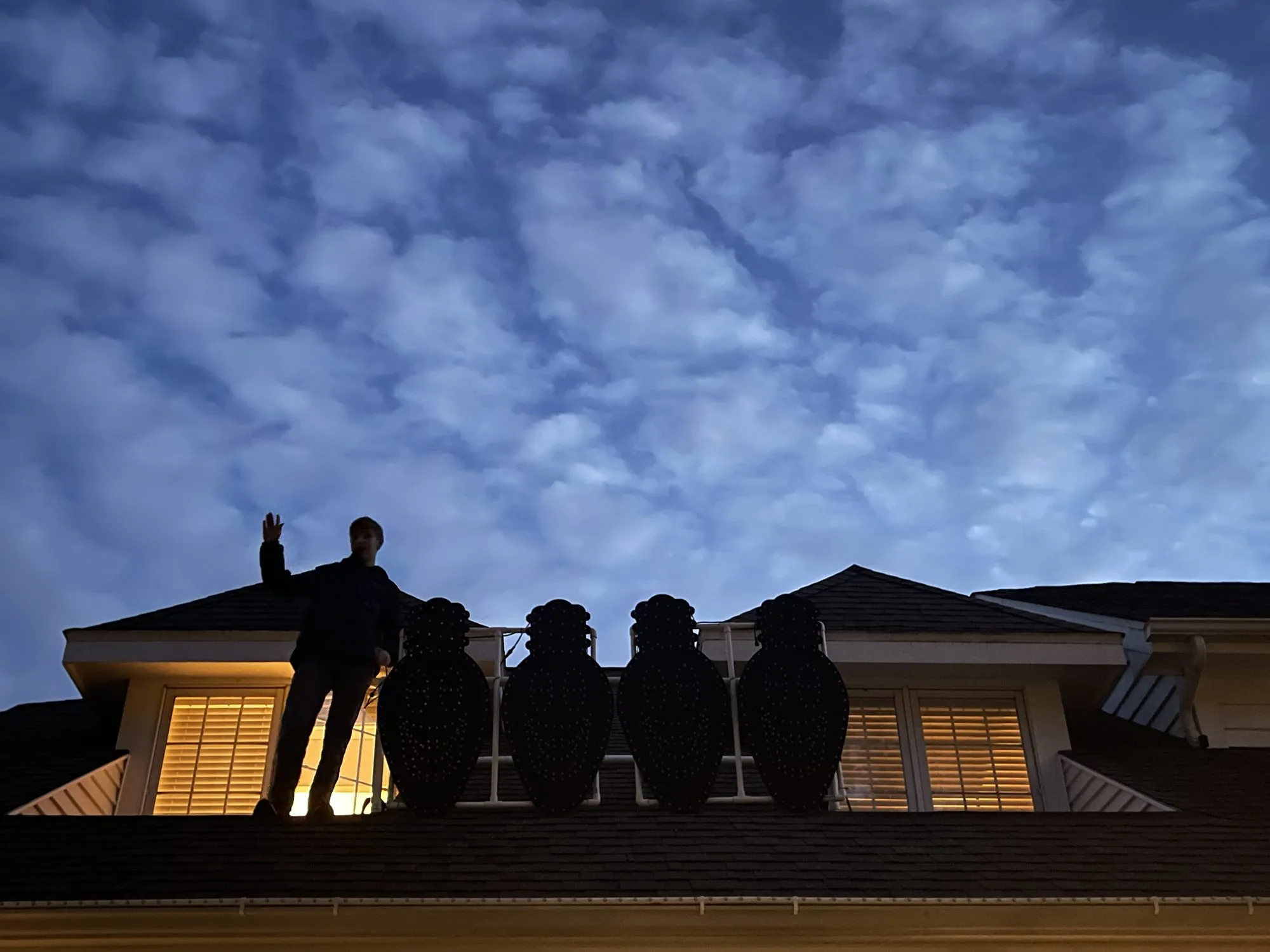 Roof crew at dusk, 2021