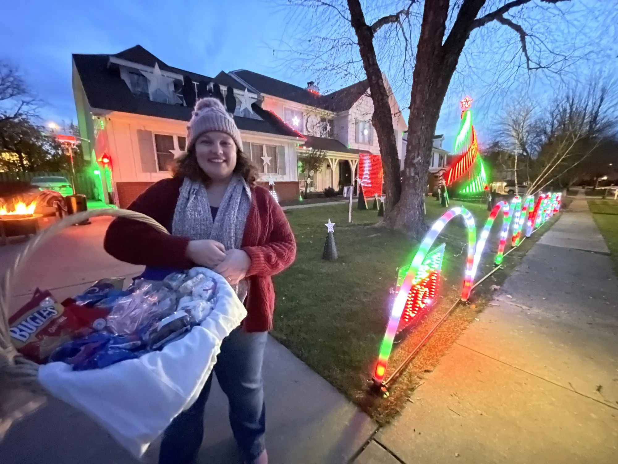 Lucinda hands out treats to her real estate clients, 2023
