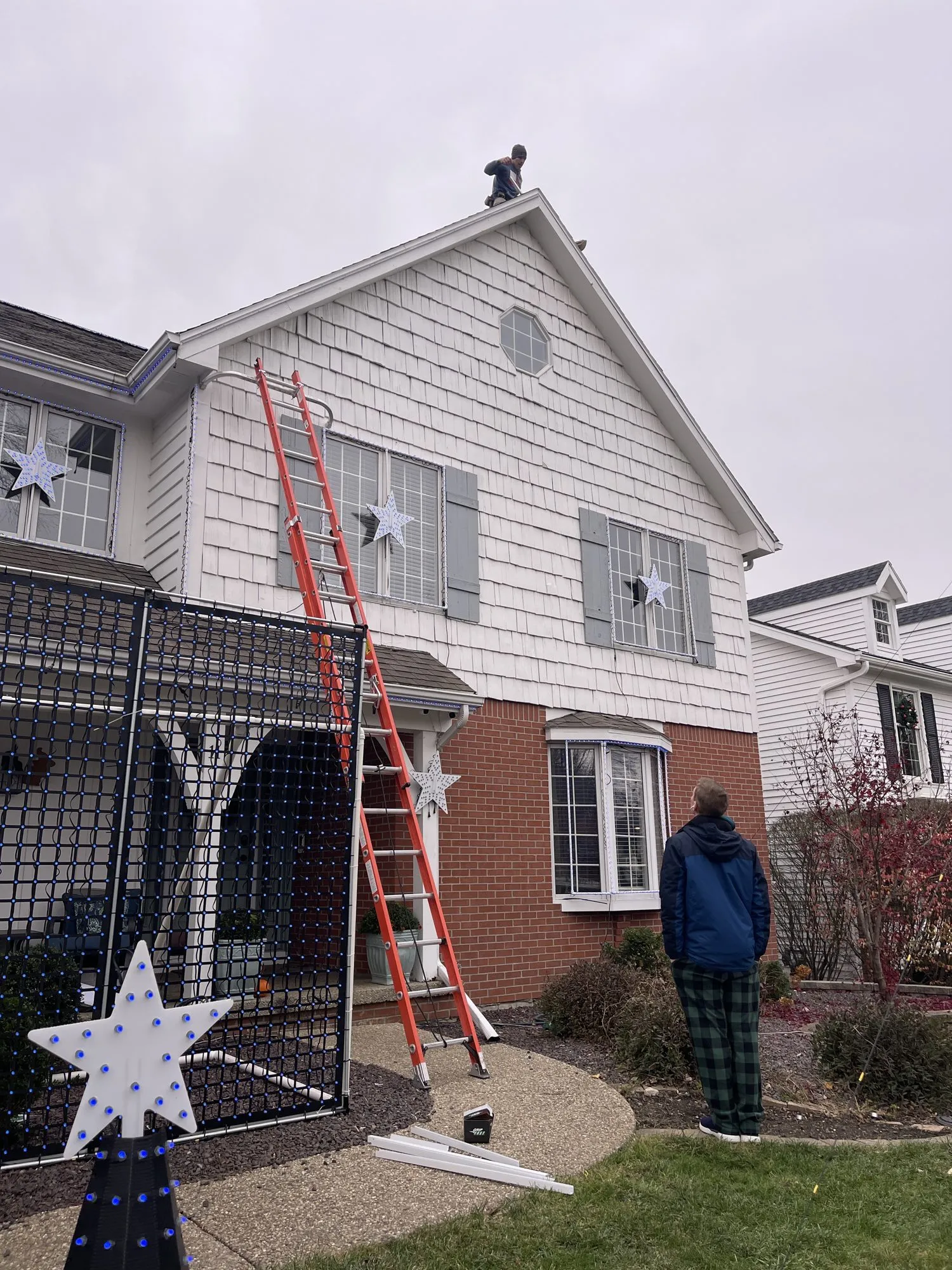 Dan on the roof peak, 2024